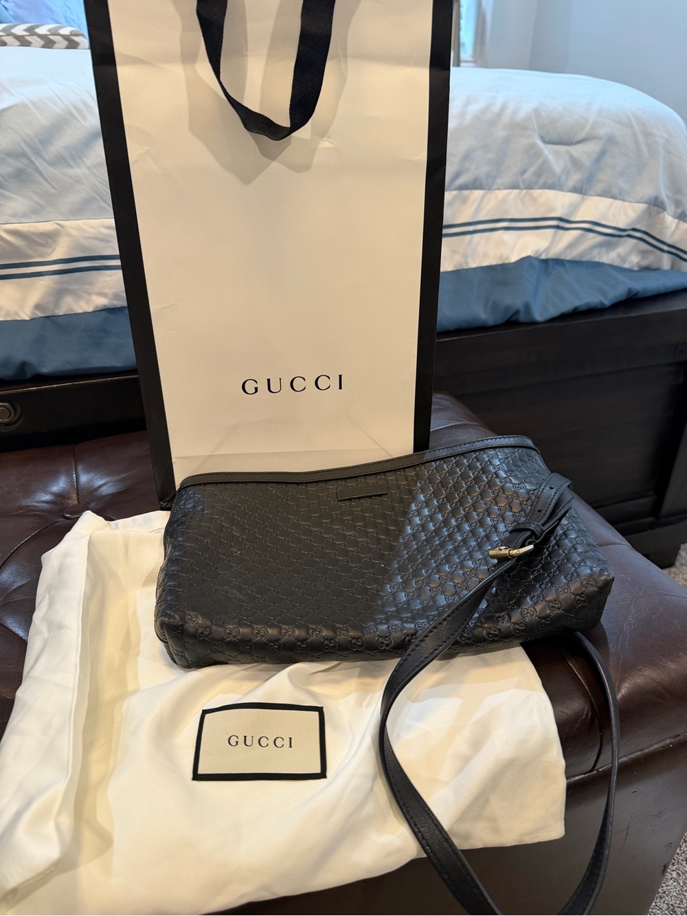 Gucci Microguccissima leather Embossed Interlocking G Crossbody Bag